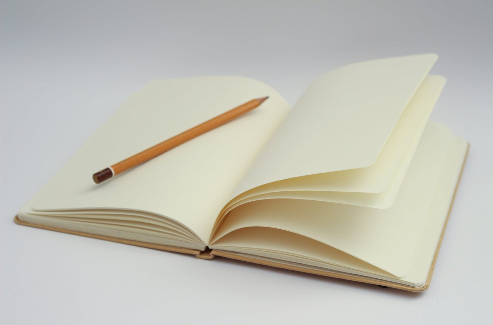 notebook writing pencil start